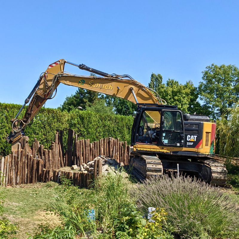 Gartengestaltung mit Palisaden Schuch Gartenbau und Baggerarbeiten